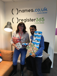 Caroline & Chirag with Christmas gifts