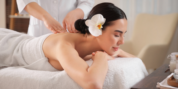 A woman getting a sports massage near me